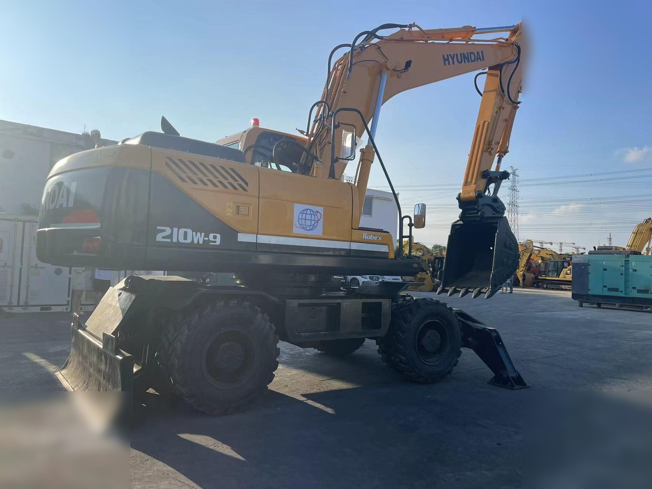 HYUNDAI ROBEX 210W-9 - Колісний екскаватор: фото 2 HYUNDAI ROBEX 210W-9 - Колісний екскаватор: фото 2