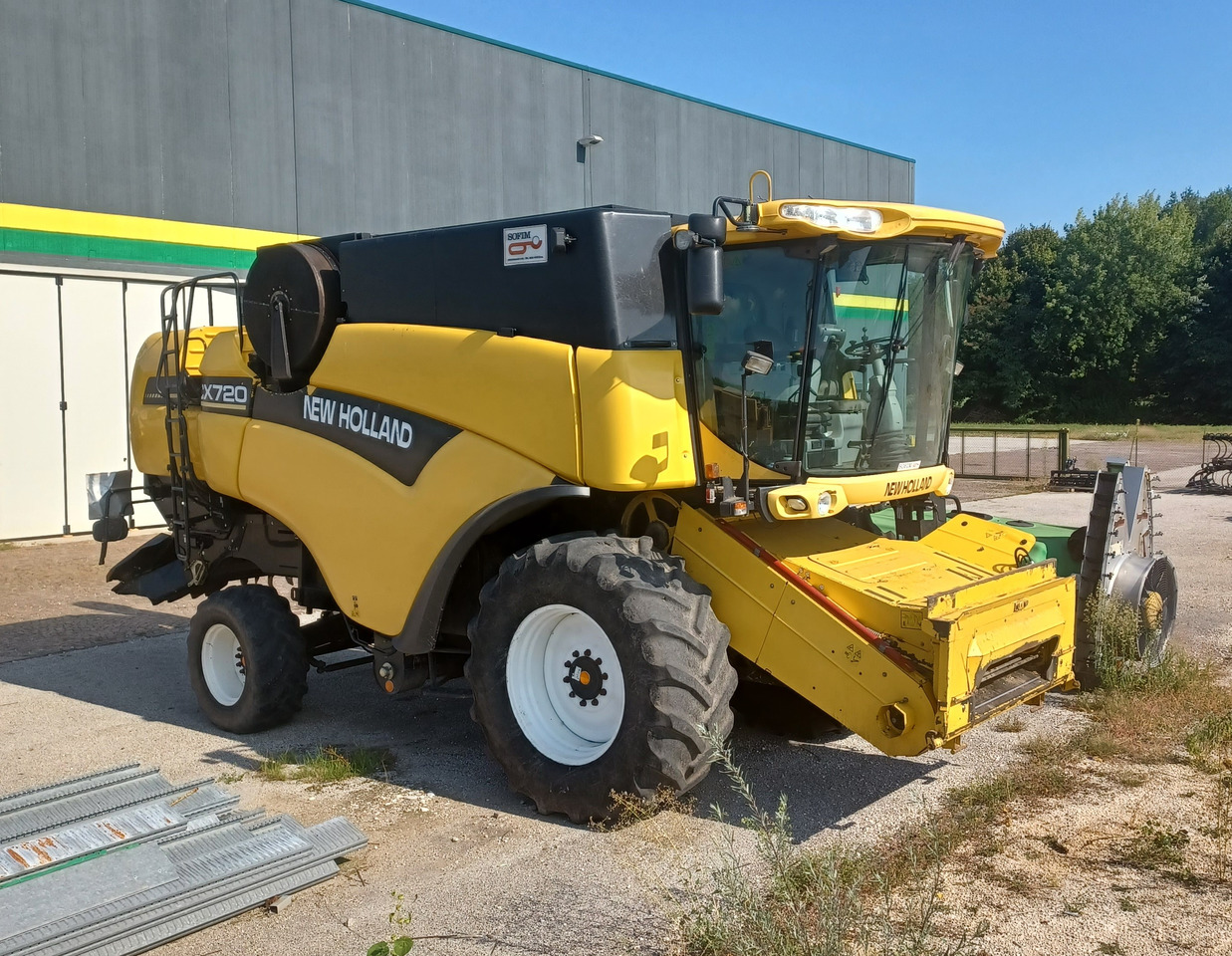 NEW HOLLAND MIETITREBBIA CX 720 - Зернозбиральний комбайн: фото 1 NEW HOLLAND MIETITREBBIA CX 720 - Зернозбиральний комбайн: фото 1