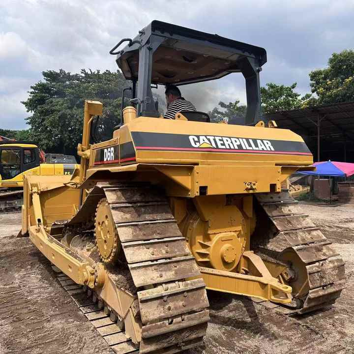 Original Caterpillar D6r Bulldozer Used Caterpillar D5 D6 D7 Bulldozer on Sale High Quality Caterpillar D6r Bulldozer - Бульдозер: фото 2 Original Caterpillar D6r Bulldozer Used Caterpillar D5 D6 D7 Bulldozer on Sale High Quality Caterpillar D6r Bulldozer - Бульдозер: фото 2
