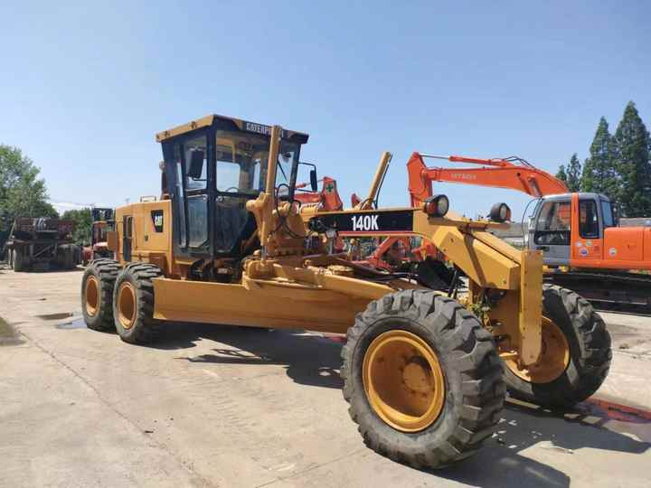 Used Caterpillar CAT 140k Land Road Motor Grader CAT140k Used Grader Cheap Price for Sale - Грейдер: фото 5 Used Caterpillar CAT 140k Land Road Motor Grader CAT140k Used Grader Cheap Price for Sale - Грейдер: фото 5