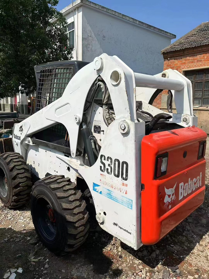 High Quality Mini Construction Machine Used Bobcat Skid Steer Loader S300 in Stock for Sale Bobcat Loader With Low Price - Міні-навантажувач: фото 4 High Quality Mini Construction Machine Used Bobcat Skid Steer Loader S300 in Stock for Sale Bobcat Loader With Low Price - Міні-навантажувач: фото 4