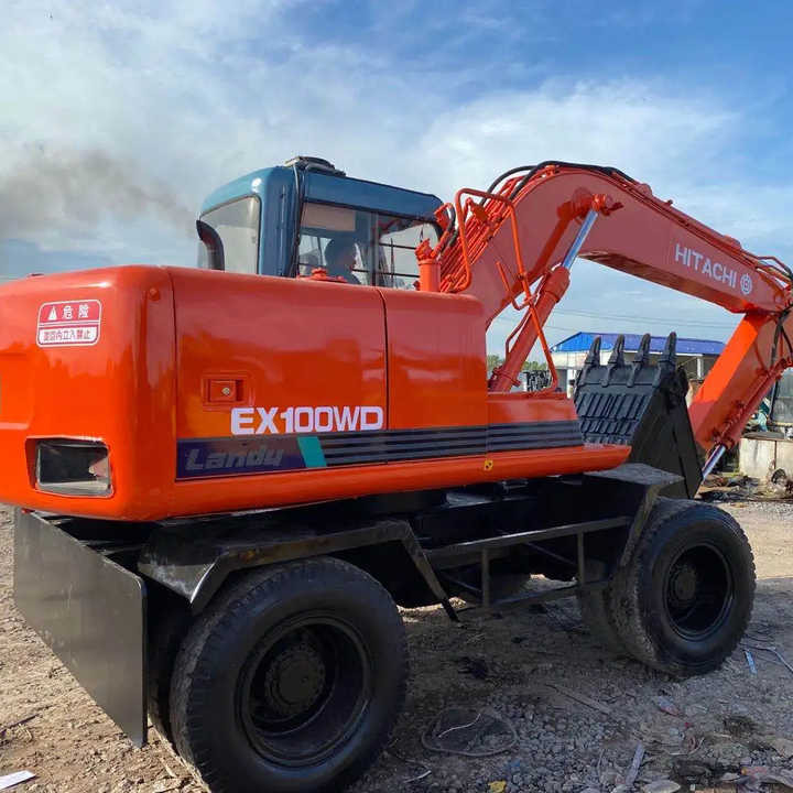 Used Hitachi Ex100WD Wheel Excavator for Sale Japan Made Hitachi Ex100wd Wheeled Excavator for Sale - Гусеничний екскаватор: фото 1 Used Hitachi Ex100WD Wheel Excavator for Sale Japan Made Hitachi Ex100wd Wheeled Excavator for Sale - Гусеничний екскаватор: фото 1