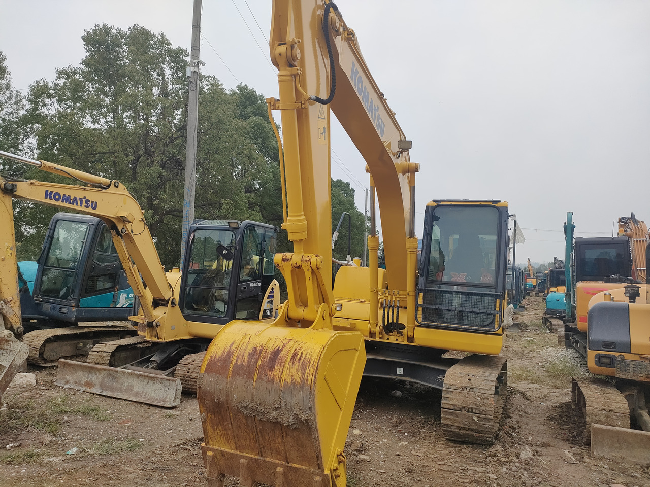 KOMATSU PC130-7 - Колісний екскаватор: фото 3 KOMATSU PC130-7 - Колісний екскаватор: фото 3
