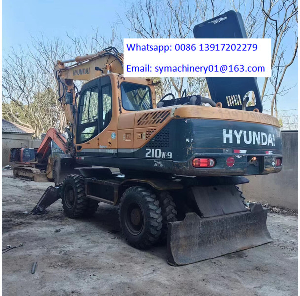 Hyundai R210W - Колісний екскаватор: фото 1 Hyundai R210W - Колісний екскаватор: фото 1