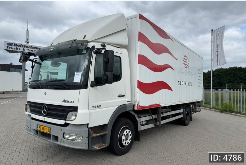 Mercedes-Benz Atego 1318 Day Cab, Euro 5, BDF / EPS automatic / DHOLLANDIA 2000KG - Контейнеровоз/ Змінний кузов вантажівка: фото 1 Mercedes-Benz Atego 1318 Day Cab, Euro 5, BDF / EPS automatic / DHOLLANDIA 2000KG - Контейнеровоз/ Змінний кузов вантажівка: фото 1