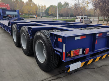 TITAN 120 Ton Lowboy Truck Trailer for Sale in Zambia - Низькорамна платформа напівпричіп: фото 5 TITAN 120 Ton Lowboy Truck Trailer for Sale in Zambia - Низькорамна платформа напівпричіп: фото 5
