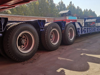 TITAN 120 Ton Lowboy Truck Trailer for Sale in Zambia - Низькорамна платформа напівпричіп: фото 4 TITAN 120 Ton Lowboy Truck Trailer for Sale in Zambia - Низькорамна платформа напівпричіп: фото 4