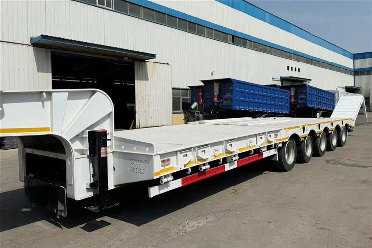 TITAN 5 Axle 100 Ton Low Bed Trailer for Sale In Tanzania - Низькорамна платформа напівпричіп: фото 4 TITAN 5 Axle 100 Ton Low Bed Trailer for Sale In Tanzania - Низькорамна платформа напівпричіп: фото 4
