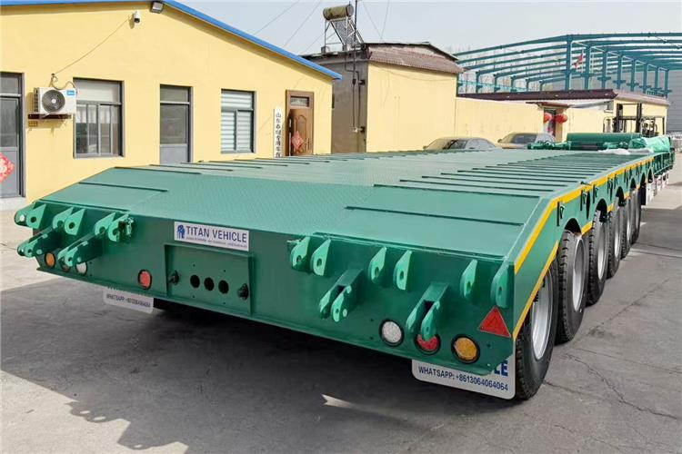 TITAN 6 Axle 80 Ton Low Loader Semi Trailer for Sale In Zambia - Низькорамна платформа напівпричіп: фото 3 TITAN 6 Axle 80 Ton Low Loader Semi Trailer for Sale In Zambia - Низькорамна платформа напівпричіп: фото 3