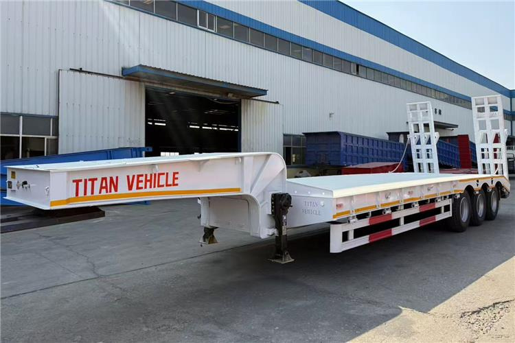TITAN 60 Ton Low Bed Trailer for Sale In Tananiza - Низькорамна платформа напівпричіп: фото 1 TITAN 60 Ton Low Bed Trailer for Sale In Tananiza - Низькорамна платформа напівпричіп: фото 1