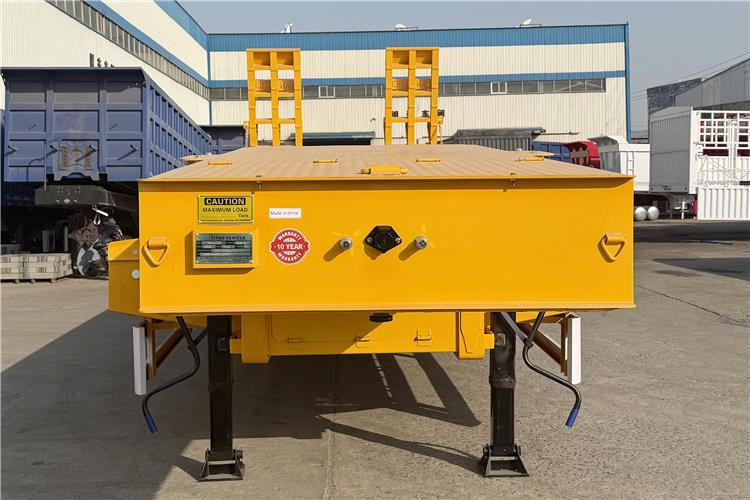 TITAN 80 Ton Low Loader Trailer for Sale Price In Guyana - Низькорамна платформа напівпричіп: фото 2 TITAN 80 Ton Low Loader Trailer for Sale Price In Guyana - Низькорамна платформа напівпричіп: фото 2