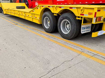 TITAN Rgn Lowboy Trailer for Sale in Zambia - Низькорамна платформа напівпричіп: фото 2 TITAN Rgn Lowboy Trailer for Sale in Zambia - Низькорамна платформа напівпричіп: фото 2