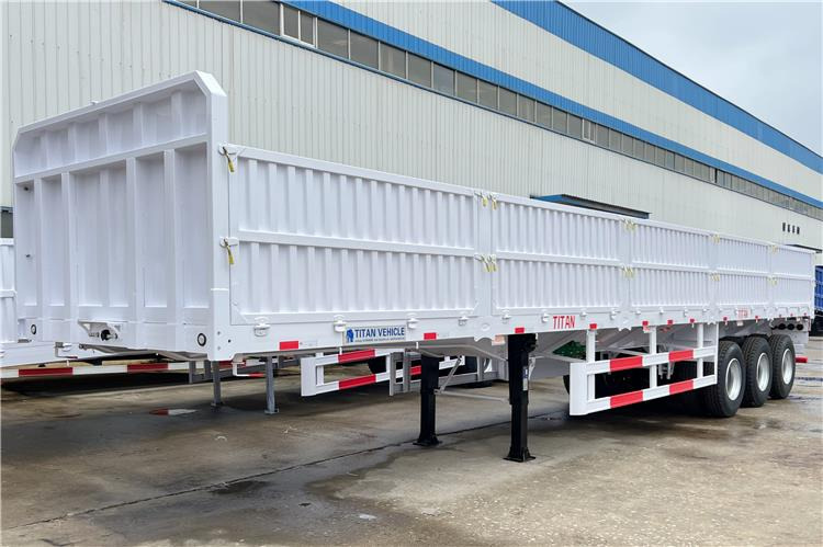 TITAN Tri Axle Dropside Trailer For Sale In Nigeria Lagos - Бортовий напівпричіп/ Платформа: фото 1 TITAN Tri Axle Dropside Trailer For Sale In Nigeria Lagos - Бортовий напівпричіп/ Платформа: фото 1