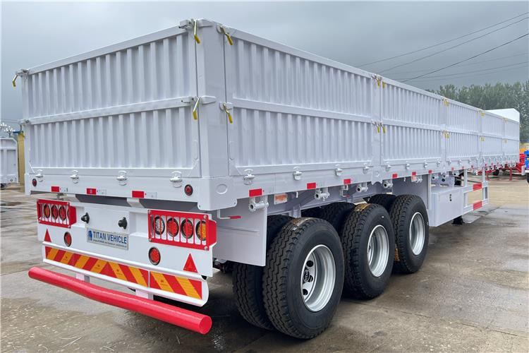 TITAN Tri Axle Dropside Trailer For Sale In Nigeria Lagos - Бортовий напівпричіп/ Платформа: фото 2 TITAN Tri Axle Dropside Trailer For Sale In Nigeria Lagos - Бортовий напівпричіп/ Платформа: фото 2