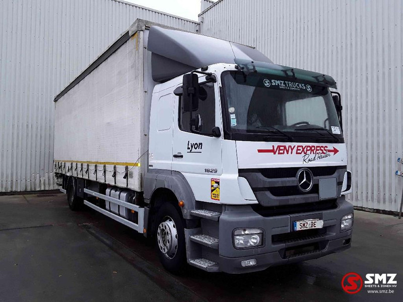 Mercedes-Benz Axor 1829 manual - Тентована вантажівка: фото 1 Mercedes-Benz Axor 1829 manual - Тентована вантажівка: фото 1