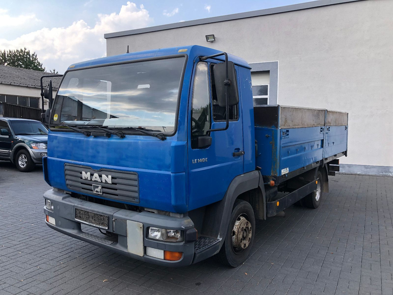 MAN LE 140 C Klima, Tempomat, TÜV 11-2025 - Легка бортова вантажівка: фото 1 MAN LE 140 C Klima, Tempomat, TÜV 11-2025 - Легка бортова вантажівка: фото 1