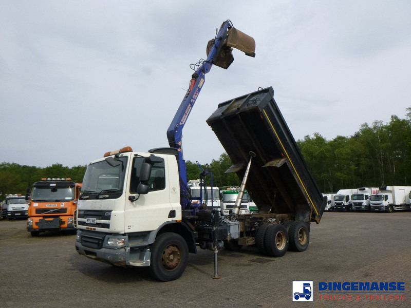 DAF CF 75.310 6x4 RHD tipper + HMF 1144 K-1 + grapple - Вантажівка з маніпулятором: фото 1 DAF CF 75.310 6x4 RHD tipper + HMF 1144 K-1 + grapple - Вантажівка з маніпулятором: фото 1
