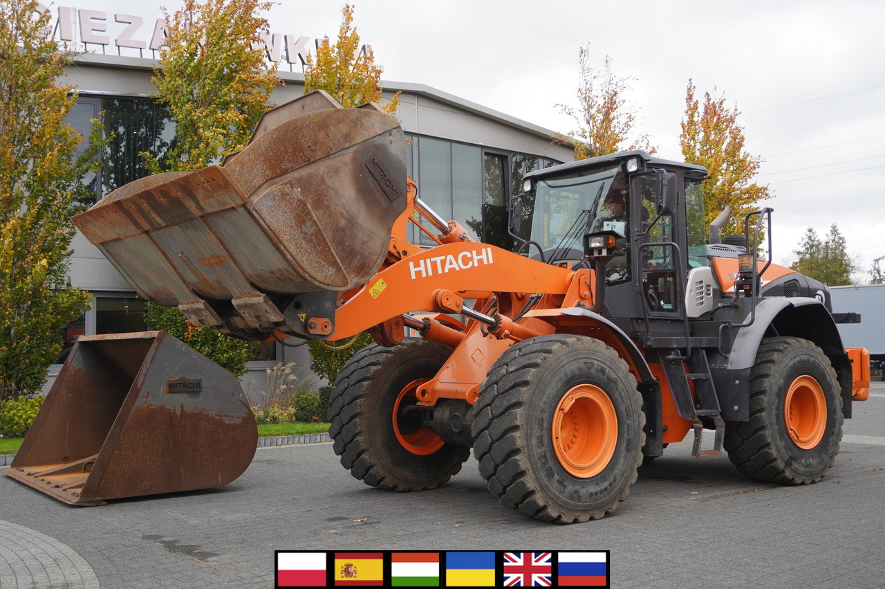 HITACHI ZW220 articulated loader / 2 buckets - Колісний навантажувач: фото 1 HITACHI ZW220 articulated loader / 2 buckets - Колісний навантажувач: фото 1