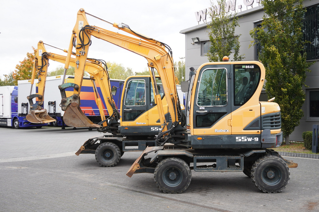 Hyundai Robex 55W-9 Wheeled Excavator 5.5t / 2pcs - Міні-екскаватор: фото 1 Hyundai Robex 55W-9 Wheeled Excavator 5.5t / 2pcs - Міні-екскаватор: фото 1