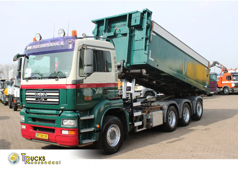 MAN TGA 35.400 8X4 + MANUAL! + NCH kipper/ bitum sprayer - Тросовий мультиліфт: фото 1 MAN TGA 35.400 8X4 + MANUAL! + NCH kipper/ bitum sprayer - Тросовий мультиліфт: фото 1