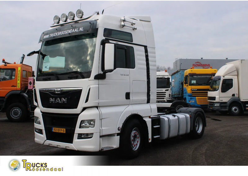 MAN TGX 18.440 + euro 6 + double tank + spoiler - Тягач: фото 1 MAN TGX 18.440 + euro 6 + double tank + spoiler - Тягач: фото 1