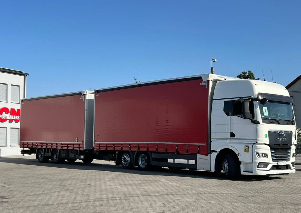 MAN TGX 26.470 z przyczepą Redos - Тентована вантажівка: фото 2 MAN TGX 26.470 z przyczepą Redos - Тентована вантажівка: фото 2