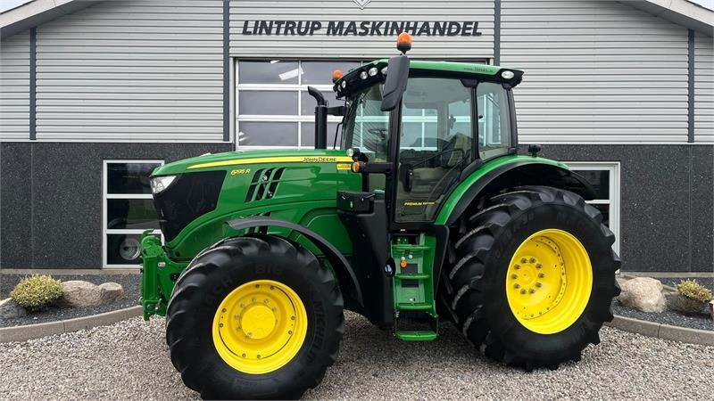 John Deere 6195R Premium Edition med frontlift - Трактор: фото 1 John Deere 6195R Premium Edition med frontlift - Трактор: фото 1