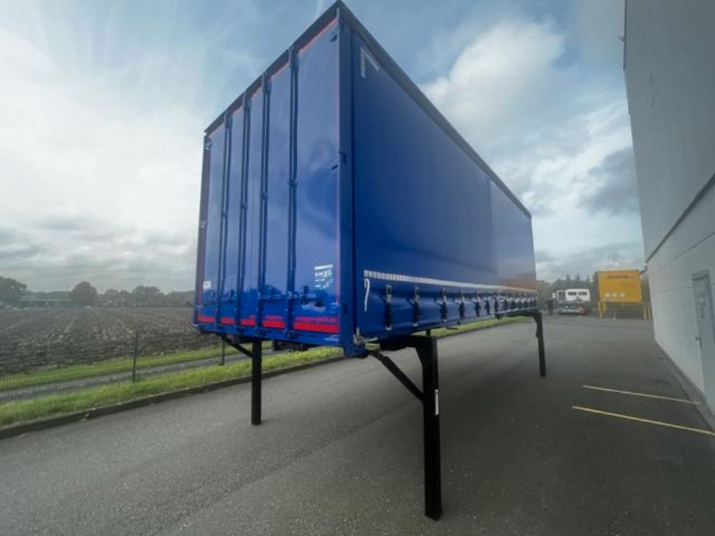 Krone Heck mit Portaltüren - Тентований кузов: фото 1 Krone Heck mit Portaltüren - Тентований кузов: фото 1