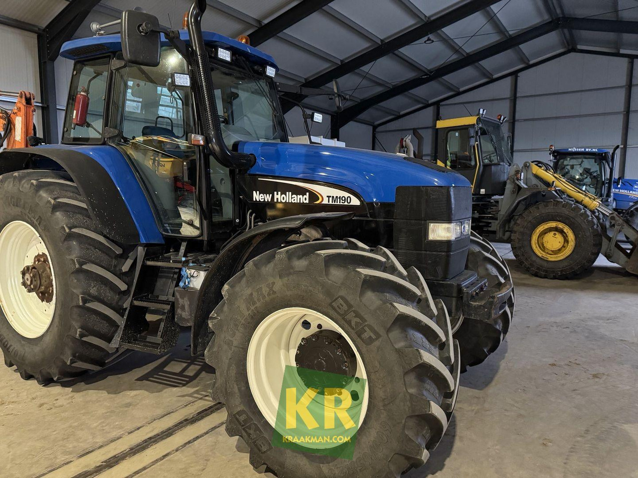 New Holland TM190 - Трактор: фото 1 New Holland TM190 - Трактор: фото 1