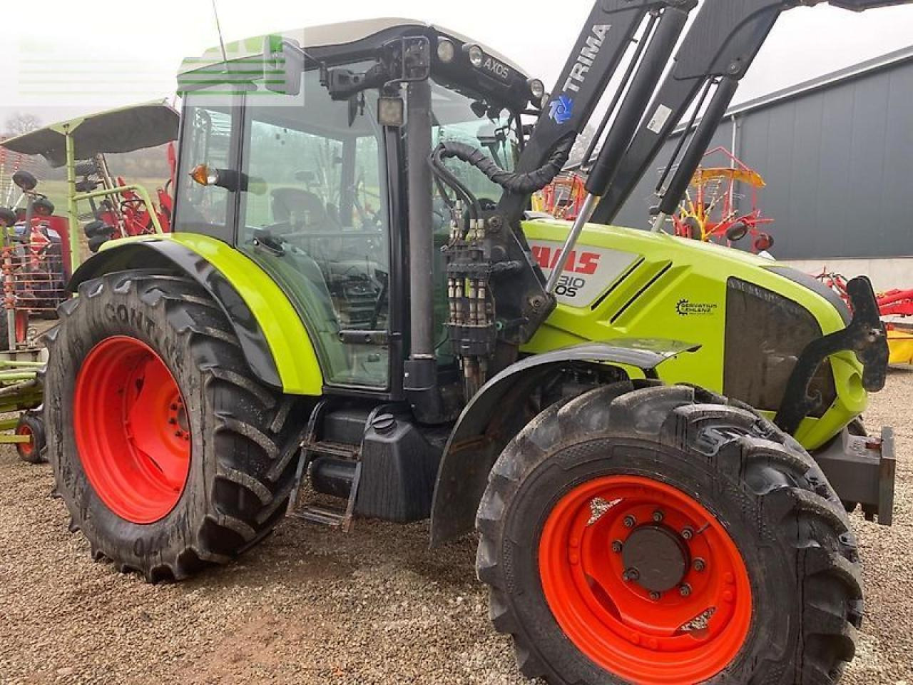 CLAAS axos 310c C - Трактор: фото 1 CLAAS axos 310c C - Трактор: фото 1