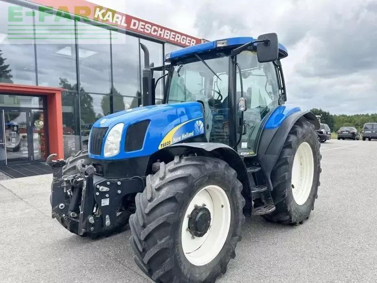 New Holland t6020 elite Elite - Трактор: фото 1 New Holland t6020 elite Elite - Трактор: фото 1