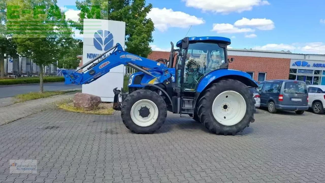 New Holland t6020 elite - Трактор: фото 1 New Holland t6020 elite - Трактор: фото 1