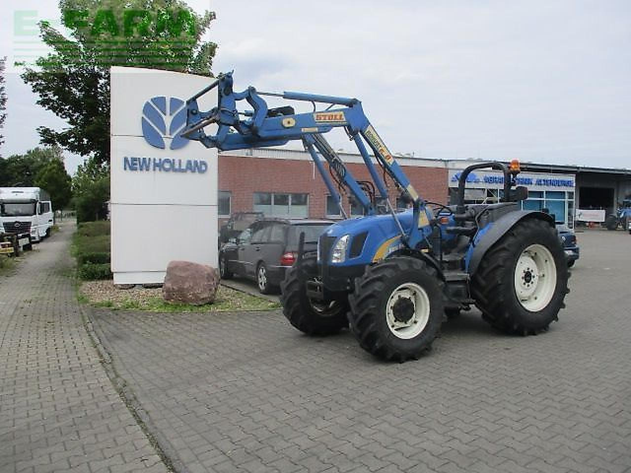 New Holland tn70 a niedrige bauhöhe - Трактор: фото 1 New Holland tn70 a niedrige bauhöhe - Трактор: фото 1