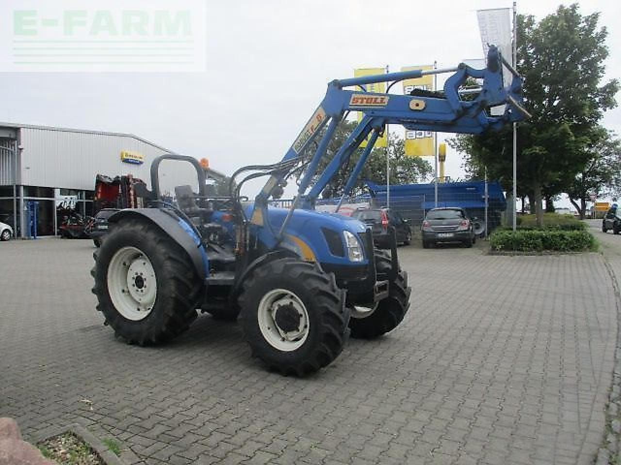 New Holland tn70 a niedrige bauhöhe - Трактор: фото 3 New Holland tn70 a niedrige bauhöhe - Трактор: фото 3