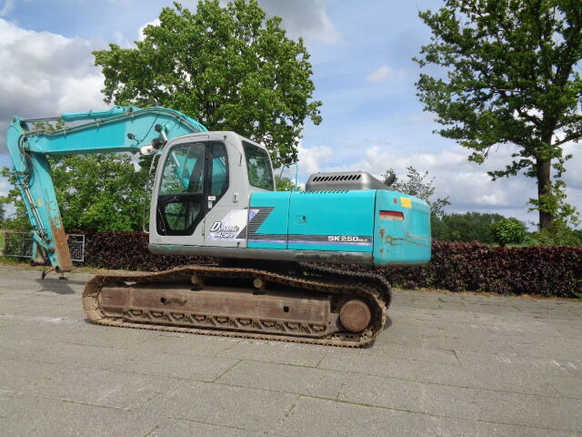 Kobelco SK250NLC - Гусеничний екскаватор: фото 1 Kobelco SK250NLC - Гусеничний екскаватор: фото 1