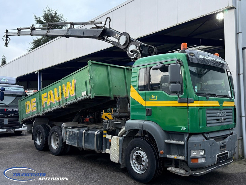 MAN TGA 26.390 6x4, Handgeschakeld, HIAB 166 E-4 - Самоскид вантажівка, Вантажівка з маніпулятором: фото 1 MAN TGA 26.390 6x4, Handgeschakeld, HIAB 166 E-4 - Самоскид вантажівка, Вантажівка з маніпулятором: фото 1