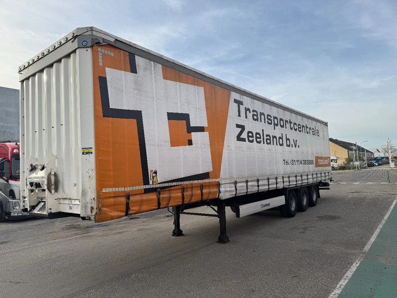 Krone SD 3 AXLE DRUM BRAKES SLIDING ROOF - Тентований напівпричіп: фото 1 Krone SD 3 AXLE DRUM BRAKES SLIDING ROOF - Тентований напівпричіп: фото 1