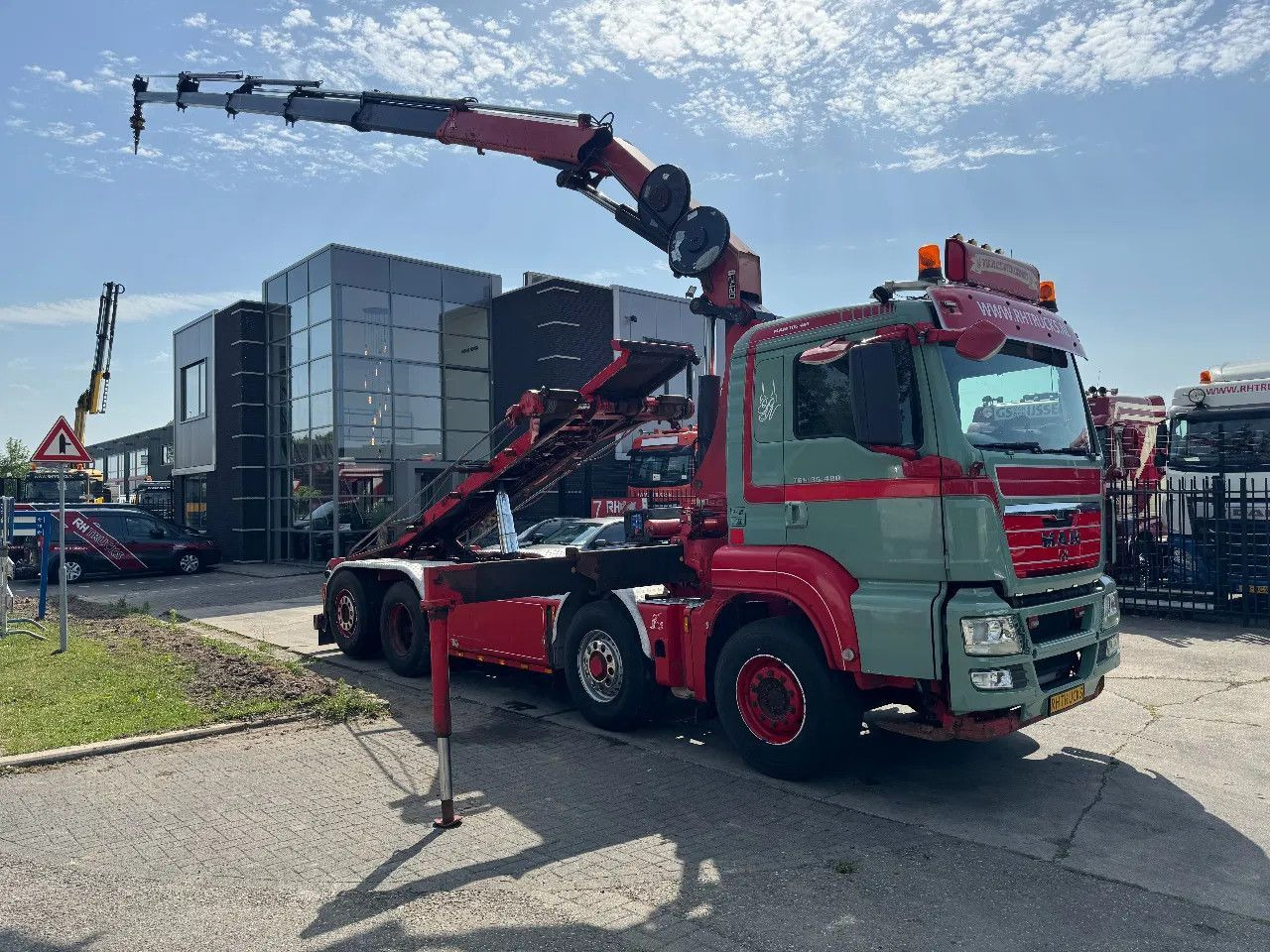 MAN TGS 35.480 8X4 HMF 2420 K5 + HMF ABLE + REMOTE C - Гаковий мультиліфт вантажівка, Вантажівка з маніпулятором: фото 1 MAN TGS 35.480 8X4 HMF 2420 K5 + HMF ABLE + REMOTE C - Гаковий мультиліфт вантажівка, Вантажівка з маніпулятором: фото 1