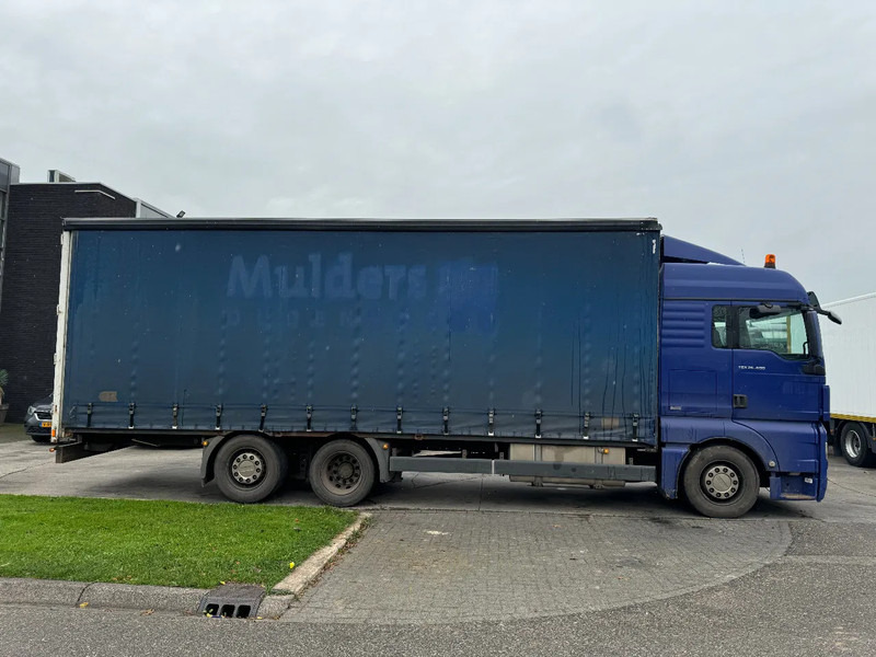 MAN TGX 26.400 6X2 - EURO 4 + LIFT + STEERING AXLE - Тентована вантажівка: фото 4 MAN TGX 26.400 6X2 - EURO 4 + LIFT + STEERING AXLE - Тентована вантажівка: фото 4