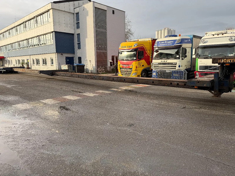 Низькорамна платформа напівпричіп Nooteboom MC0 105-08V, 2 EXTENDABLE 12.35 + 12,05 8 AXLE, 2 LIFT AXLES, 7 AXLE STEERING, REMOTE CONTROLE: фото 7 Низькорамна платформа напівпричіп Nooteboom MC0 105-08V, 2 EXTENDABLE 12.35 + 12,05 8 AXLE, 2 LIFT AXLES, 7 AXLE STEERING, REMOTE CONTROLE: фото 7