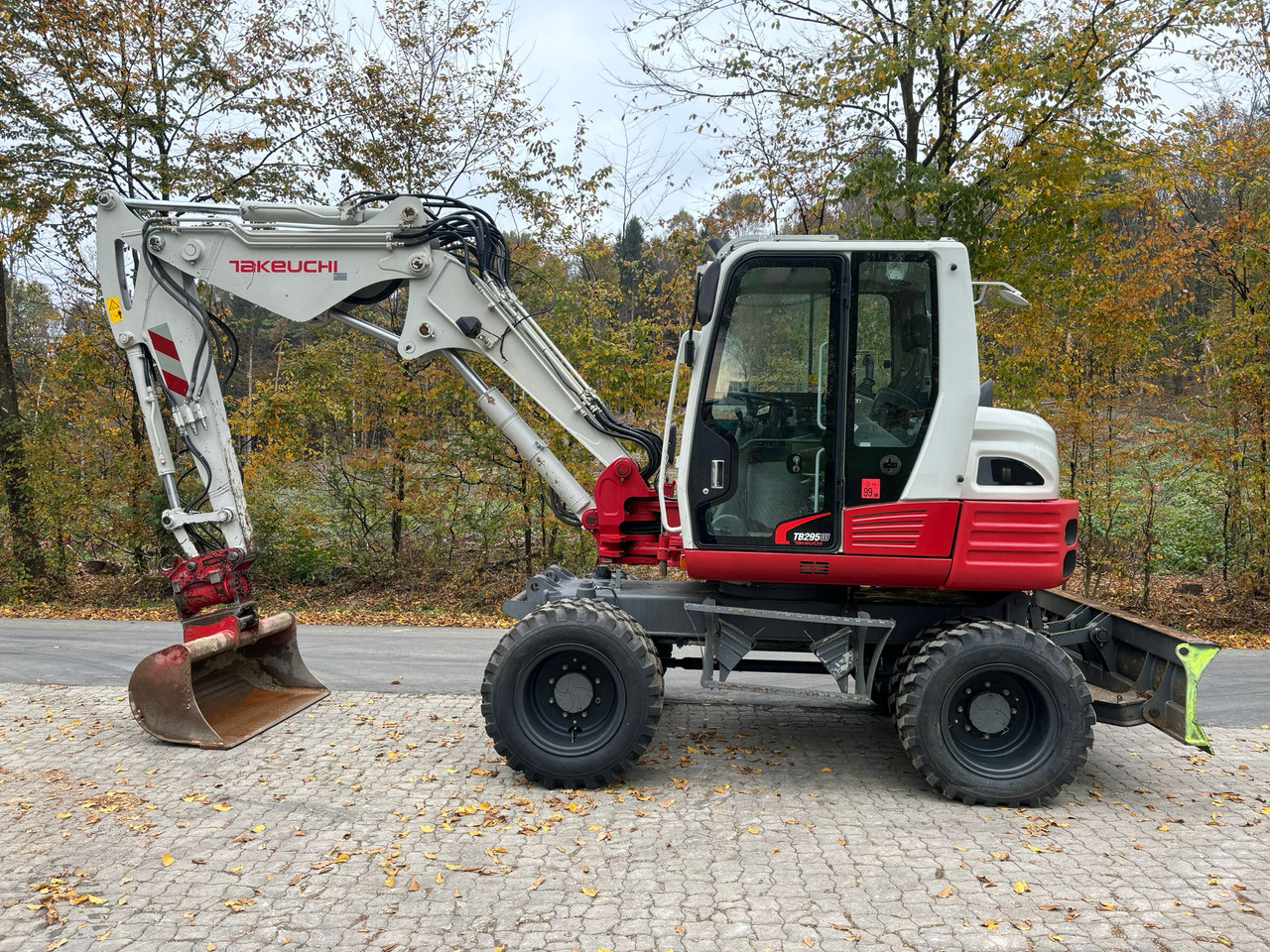 TAKEUCHI TB 295 W - Колісний екскаватор: фото 1 TAKEUCHI TB 295 W - Колісний екскаватор: фото 1