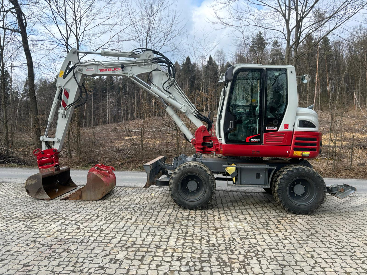TAKEUCHI TB 295 W - Колісний екскаватор: фото 1 TAKEUCHI TB 295 W - Колісний екскаватор: фото 1