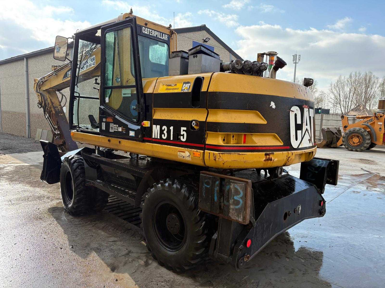 Caterpillar M315 - Колісний екскаватор: фото 2 Caterpillar M315 - Колісний екскаватор: фото 2