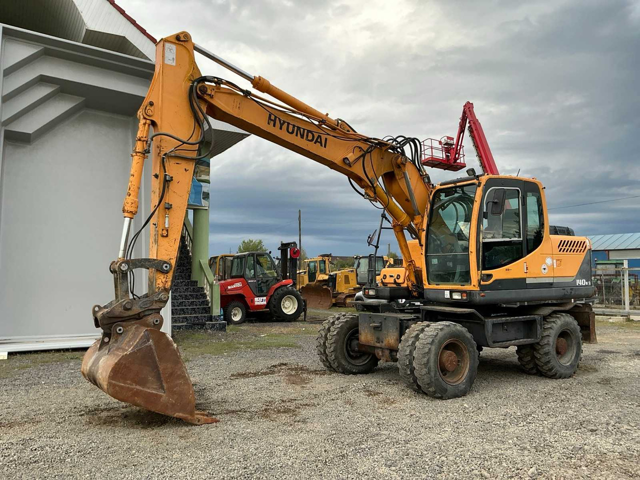 HYUNDAI ROBEX 140W-9 - Колісний екскаватор: фото 2 HYUNDAI ROBEX 140W-9 - Колісний екскаватор: фото 2