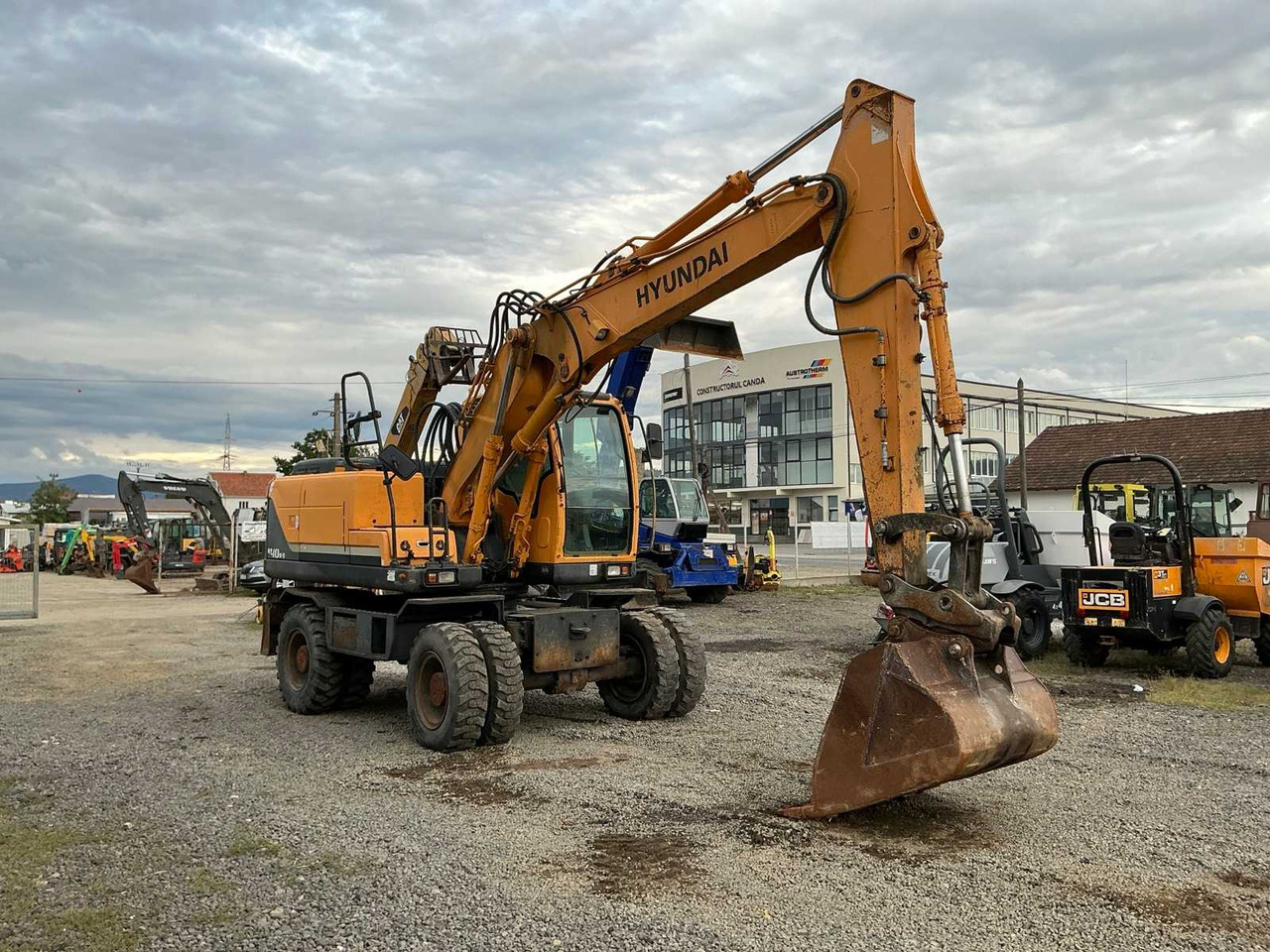 HYUNDAI ROBEX 140W-9 - Колісний екскаватор: фото 4 HYUNDAI ROBEX 140W-9 - Колісний екскаватор: фото 4