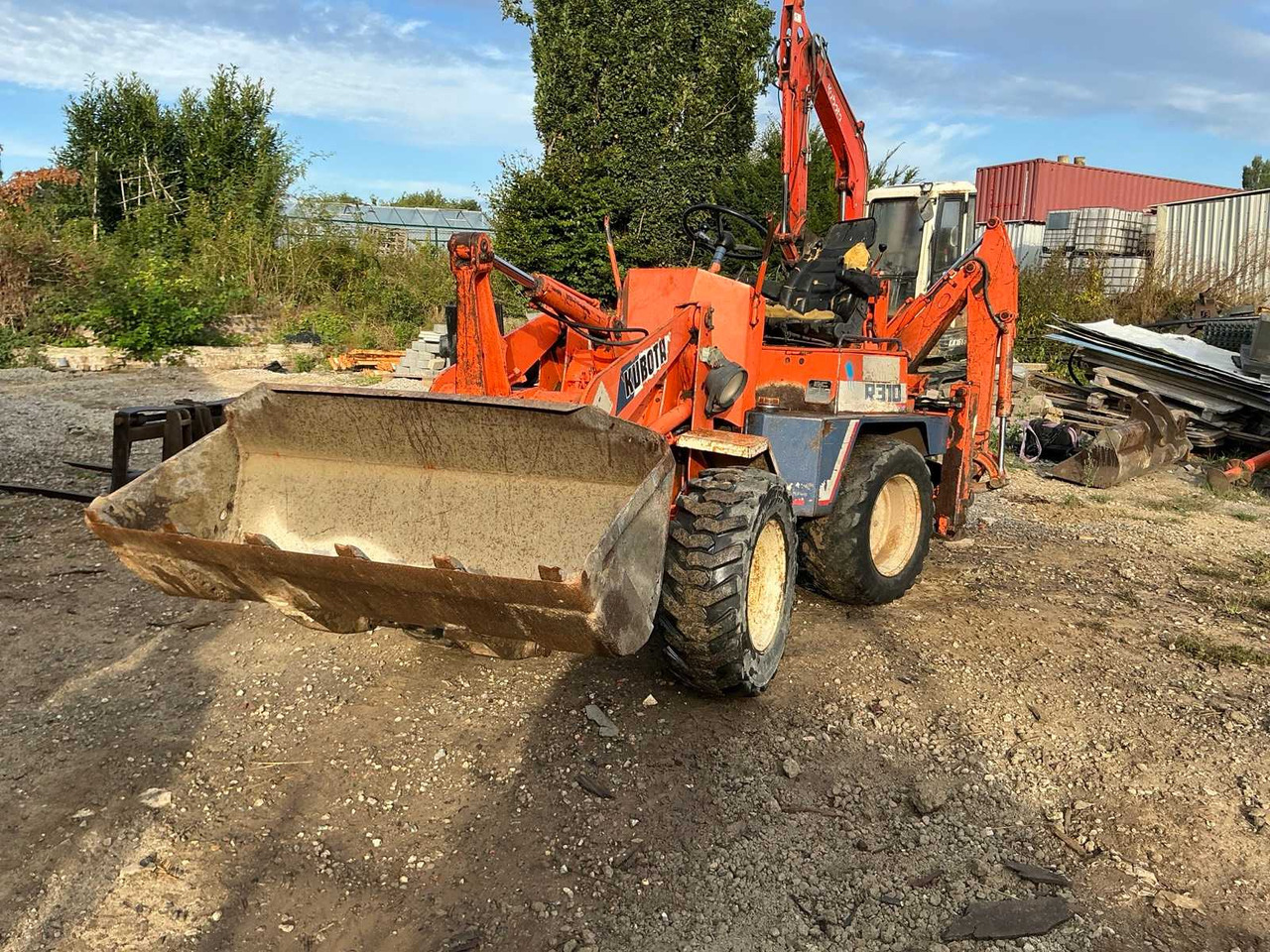 Kubota R310 met backhoe - Колісний навантажувач: фото 1 Kubota R310 met backhoe - Колісний навантажувач: фото 1