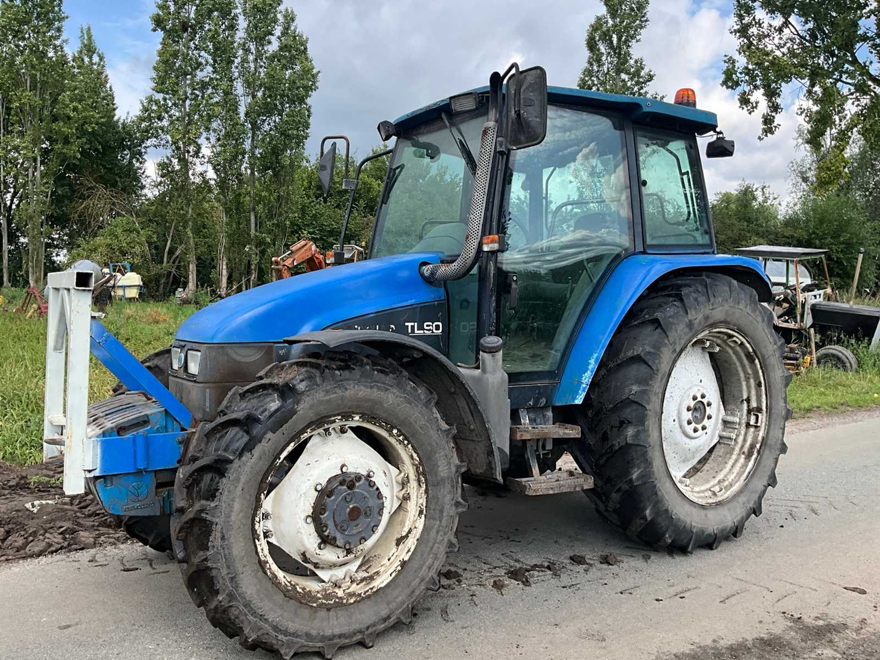 New Holland TL90 - Трактор: фото 2 New Holland TL90 - Трактор: фото 2