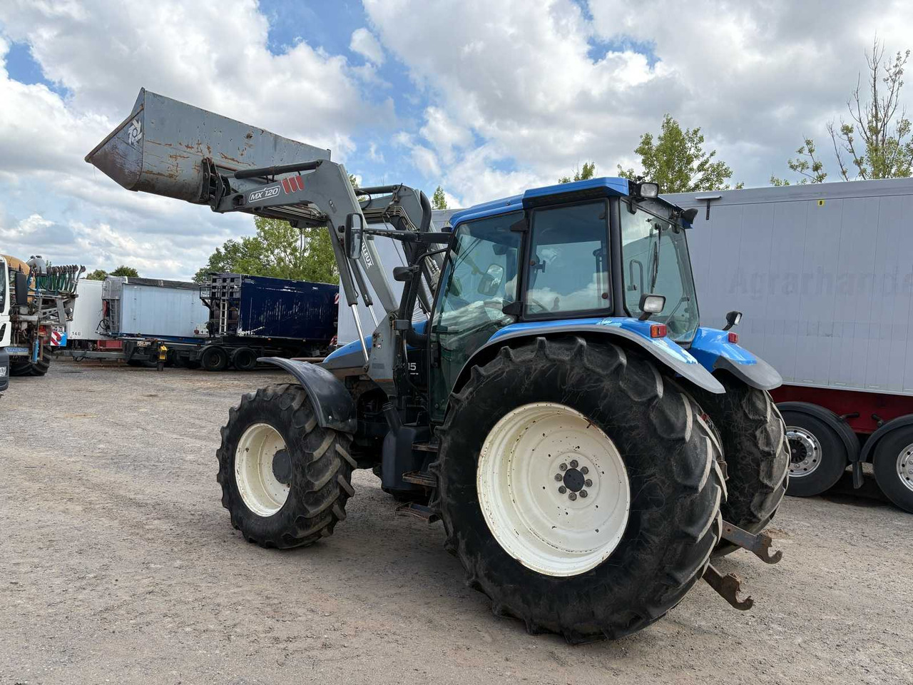 New Holland TM115 mit Frontlader - Трактор: фото 3 New Holland TM115 mit Frontlader - Трактор: фото 3
