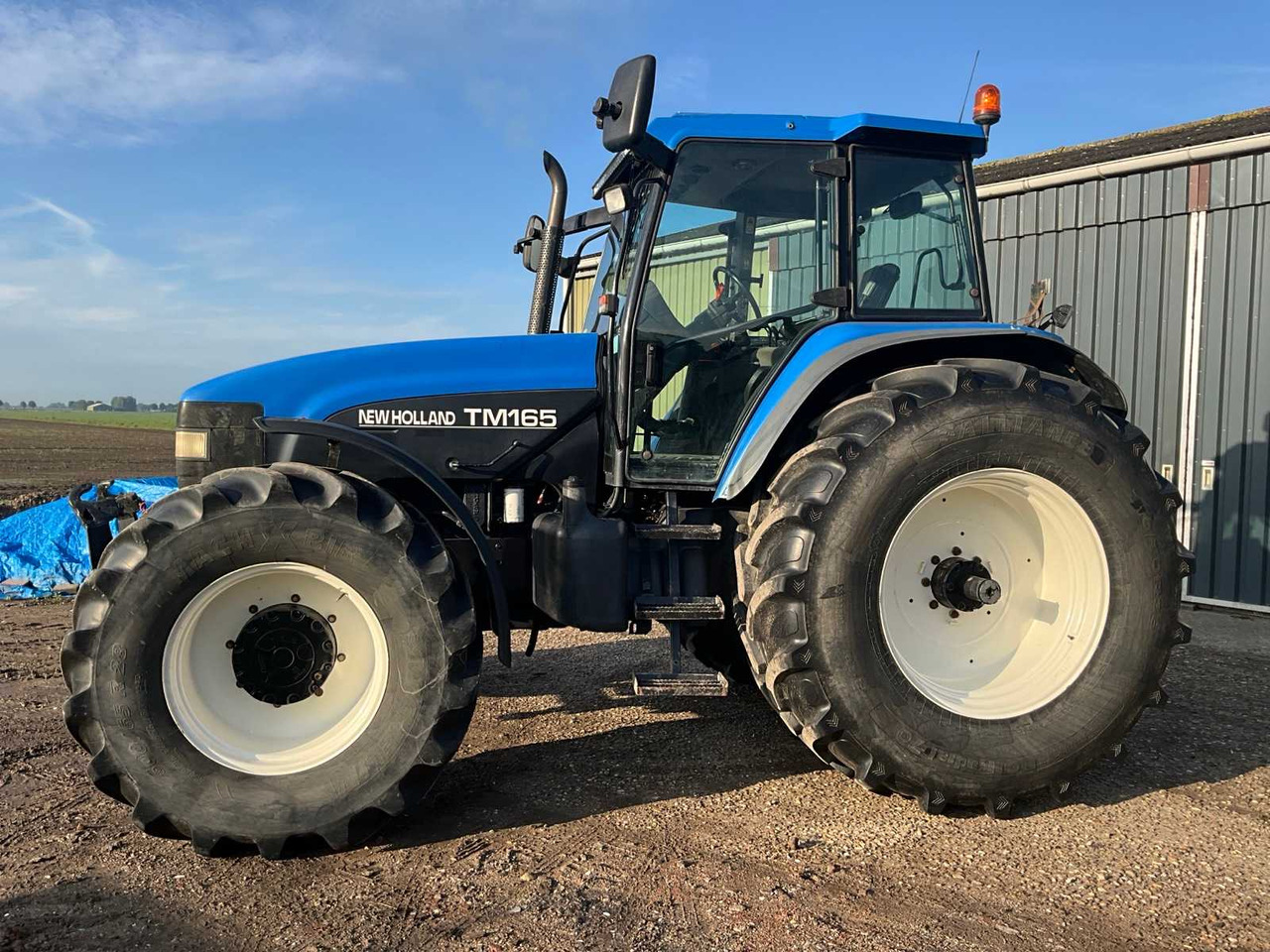 New Holland TM165 - Трактор: фото 5 New Holland TM165 - Трактор: фото 5