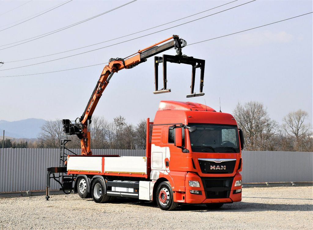 MAN TGX 26.440 Pritsche 6,60 m*TEREX 135.2-A11 MAN TGX 26.440 Pritsche 6,60 m*TEREX 135.2-A11 - Вантажівка з маніпулятором: фото 1 MAN TGX 26.440 Pritsche 6,60 m*TEREX 135.2-A11 MAN TGX 26.440 Pritsche 6,60 m*TEREX 135.2-A11 - Вантажівка з маніпулятором: фото 1